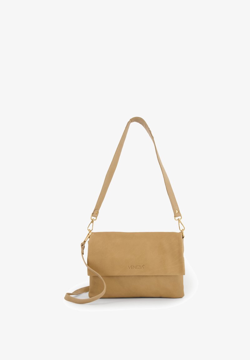 Tan leather crossbody bag with a fold-over flap, gold hardware, and a single adjustable strap. Smooth texture, minimal design, and branded.