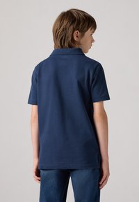 Levi's® BACK NECK TAPE  - Poloshirt - dress blues