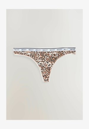 Leopárd mintás tangabugyi fehér elasztikus derékpánttal, amelyen fekete betűkkel a "NEXT" felirat található. A szövet puha és sima tapintású.