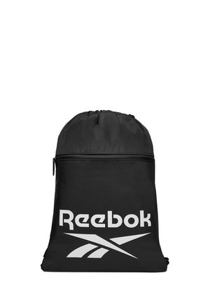 Czarna torba sportowa Reebok z sznurkiem do zaciskania, kieszenią na zamek i dużym białym logo Reebok z przodu.