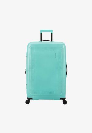 Hard-shell suitcase in teal, featuring a textured surface with diagonal lines. Retractable handle and four black swivel wheels.