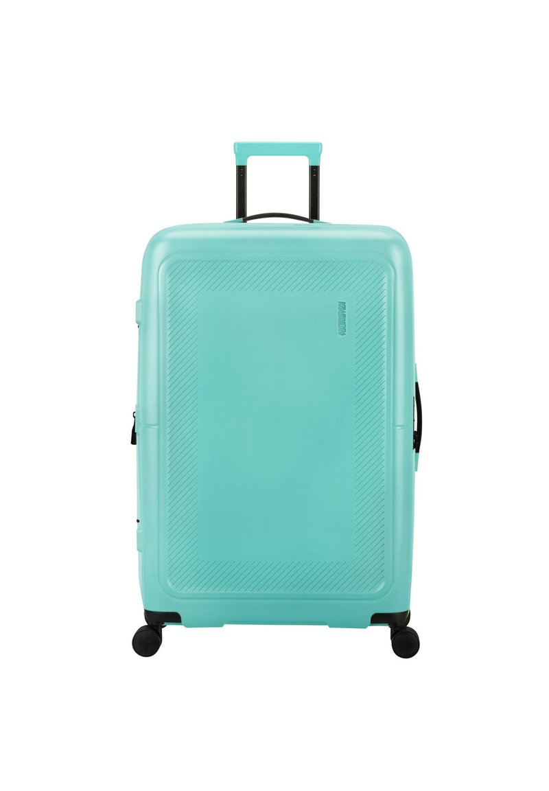 Kova kova teal, joka on varustettu teksturoitulla pinnalla, jossa on vinoviivoja. Vedettävä kahva ja neljä mustaa pyörivää pyörää.