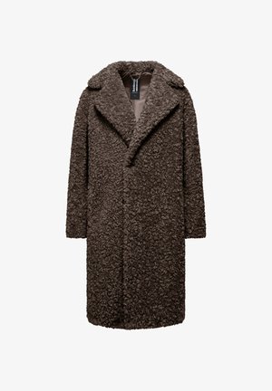 Long brown curly faux fur coat with wide lapels and a smooth inner lining, hanging with a visible black and white brand tag.