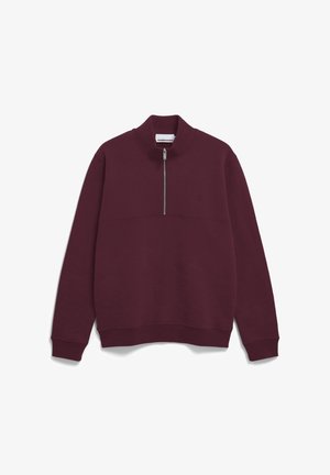 Bordeaux sweatshirt van zachte stof, met een hoge kraag en een korte rits aan de voorkant. Het ontwerp heeft een opvallende horizontale naad-details.
