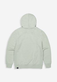 Lichtgroene hoodie met een ronde kap, ribgebreide boorden en onderkant, en stiksel aan de zijkanten. Zachte stof met een gladde textuur. Geen zichtbare logo's.