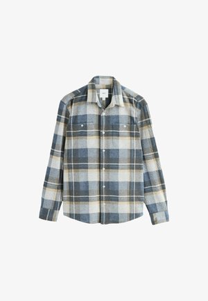 Camicia di flanella a quadri nei colori blu, grigio e beige; presenta maniche lunghe, due tasche sul petto e chiusura a bottoni. Texture morbida.