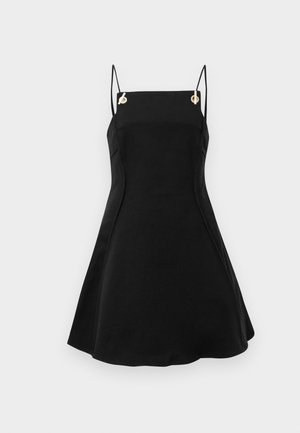 Black sleeveless dress with adjustable thin straps, featuring gold hardware accents and a flared silhouette. Smooth fabric texture.