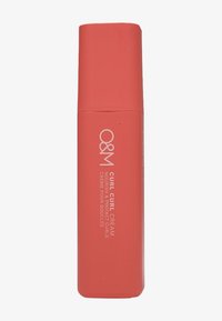 O&M Curl Curl Cream, in a matte coral tube, features white text and a cylindrical design with a rounded cap for easy application.