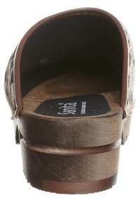 Brown wooden heel slide sandal with leopard print upper, open back, and textured footbed. Features smooth leather accents and sturdy construction.