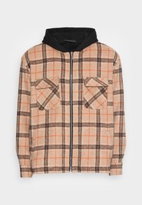 Beige och orange rutigt zip-up-jacka med svart huva, två bröstfickor med klaffar och långa ärmar med cuffar.