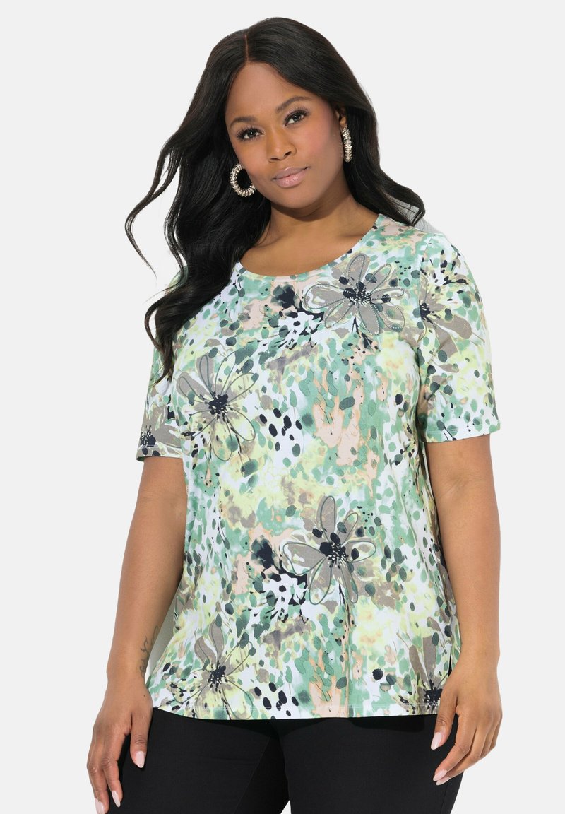 Tričkové s krátkým rukávem a kulatým výstřihem vyrobené z lehkého materiálu, s zeleným květinovým potiskem a černými a béžovými akcenty.