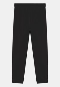 Calvin Klein Jeans MONOGRAM OFF PLACED - Träningsbyxor - ck black