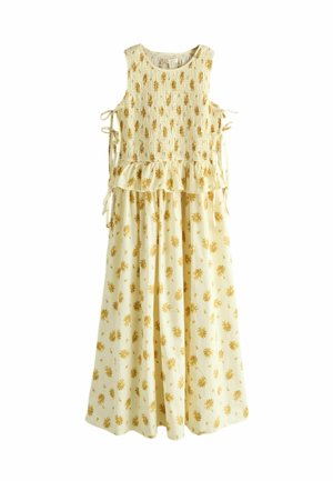 Ärmelloses cremefarbenes Kleid mit gelben Blumenmustern, gerafftem Oberteil, seitlichen Bändern und einer gerafften Peplum-Taille, die in einen fließenden Rock übergeht.