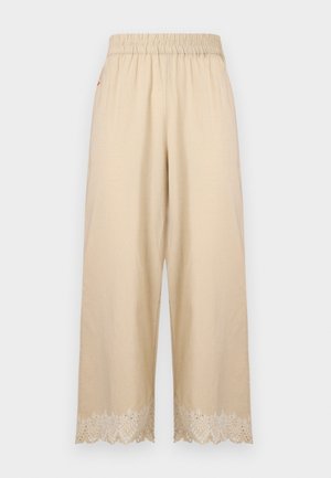 Beige bukser med vidde ben, elastisk talje og broderede bølgekantdetaljer.