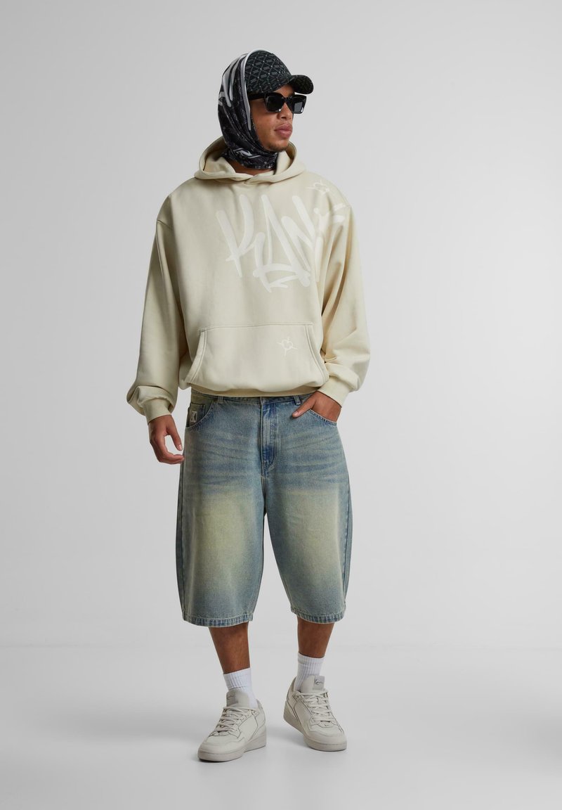 Karl Kani Hoodie zandkleur Karl Kani Hoodie zandkleur