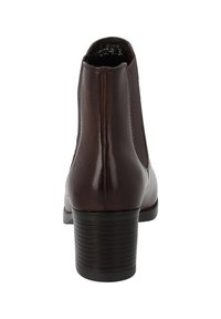 Braune Leder-Stiefelette mit elastischen Seiteneinsätzen, runder Zehenpartie und gestapeltem Absatz. Texturiertes Absatzdesign und dezentes Logodetail auf der Rückseite.