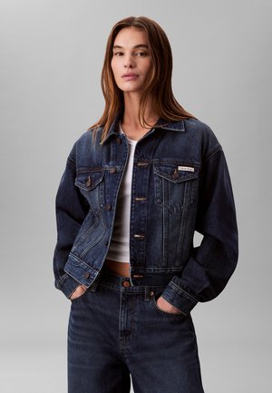 Spijkerjas - dark crescent