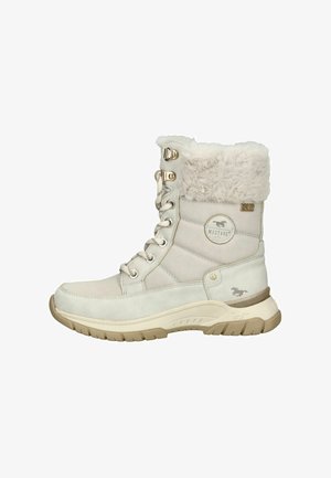 Witte enkellaarsjes met nepbont kraag, uitgerust met gouden hardware, een gestructureerde bovenkant en een gevoerde zool voor comfort. Logo aan de zijkant.