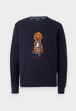 Granatowy sweter z okrągłym dekoltem. Posiada haftowanego brązowego psa w kratkowanej chustce oraz napis "HACKETT" poniżej.