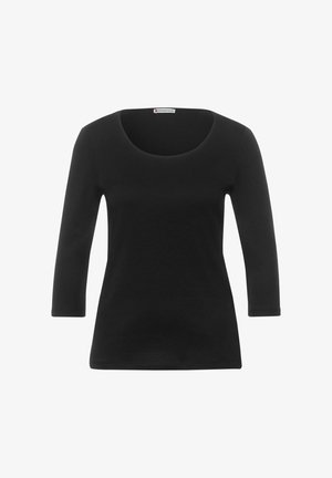 Czarna, długosleeveowa bluzka wykonana z miękkiej bawełny. Posiada okrągły dekolt i dopasowane rękawy, z prostym wykończeniem dołu. Prosty, uniwersalny fason.