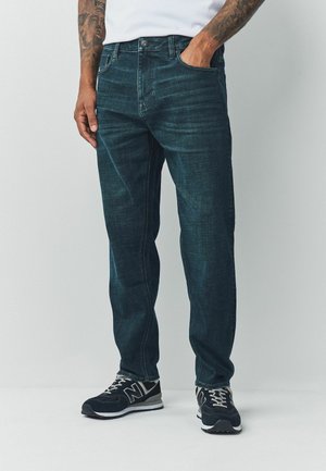 REGULAR TAPERED FIT - MOTIONFLEX - Jeans Tapered Fit - denim dark blue