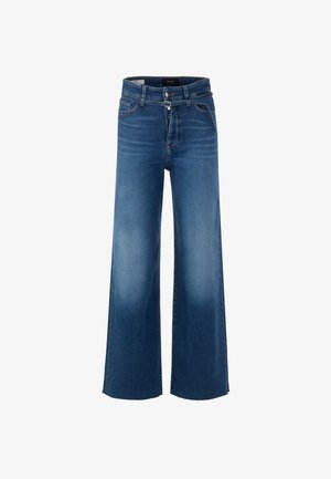 Wide-leg denim jeans in medium-wash blue. Features a high waist, front pockets, and raw hem detailing. Made of durable cotton material.