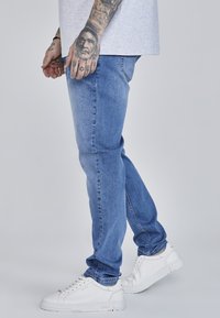 SIKSILK SLIM FIT - Slim fit jeans - blue
