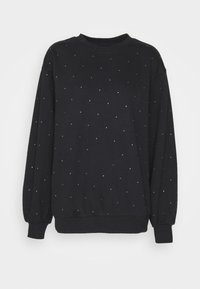 Černá mikina s dlouhými rukávy, kulatým výstřihem a stříbrnými cvočky rovnoměrně rozmístěnými po celé látce. Jemná textura.