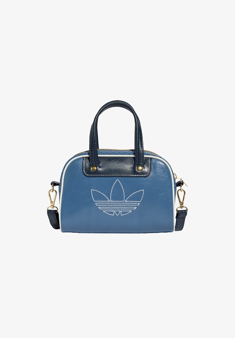 Bolsa de mão em pele sintética azul com acabamentos em azul-marinho, alças duplas no topo, uma alça destacável e logotipo bordado na frente. Fecho com zíper.