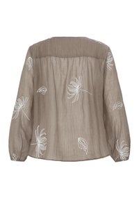 Blouse longue à manches longues couleur taupe transparent avec broderie florale blanche et poignets froncés, vue de dos sur un fond blanc.