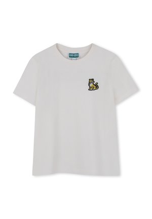 T-shirt bianco in cotone con maniche corte, caratterizzato da un design di tigre ricamato giallo e nero sul lato sinistro del petto. Collo rotondo.