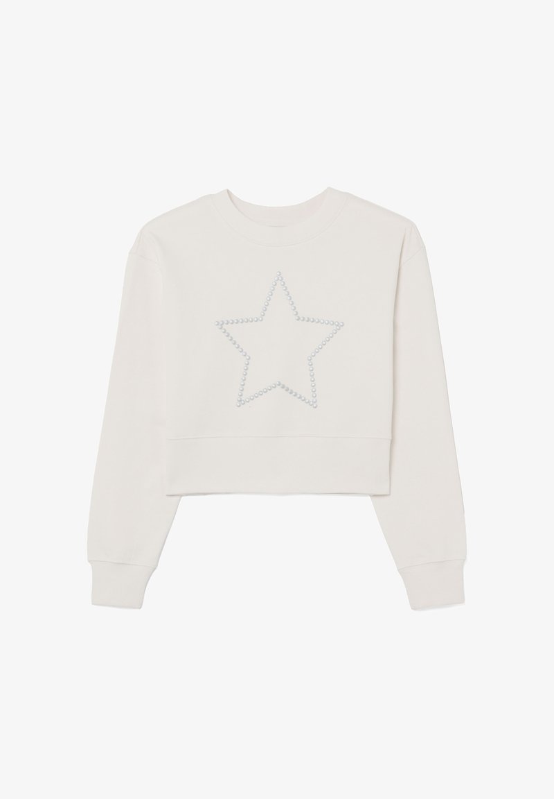 Gekürzter Sweatshirt in hellem Creme mit rundem Ausschnitt und langen Ärmeln, mit einem Sternenmuster aus kleinen, glänzenden Perlen auf der Vorderseite.