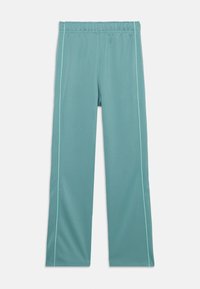 Pantalons de sport turquoise avec une taille élastique, dotés de coutures latérales vert clair et d'un tissu lisse et extensible. Design à jambe droite.