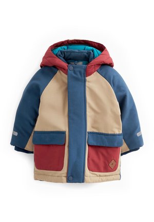 Veste d’hiver pour enfants avec capuche en blocs de couleur beige, bleu et rouge, avec poches avant et fermetures à boutons.