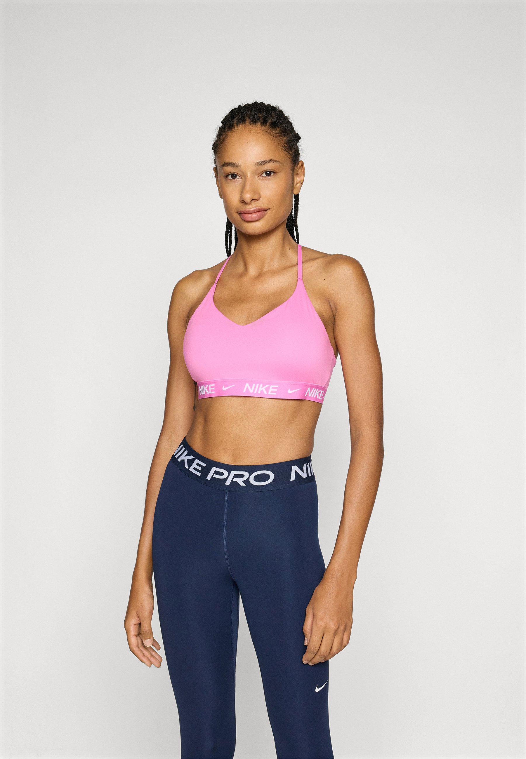 Nike Performance INDY BRA - Light support sports bra - playful pink/pink - Zalando.co.uk