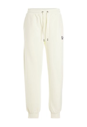 Pantaloni della tuta di un giallo chiaro, realizzati in un tessuto morbido, con una vita elastica dotata di un cordoncino, orli a costine e un piccolo dettaglio logo scuro.
