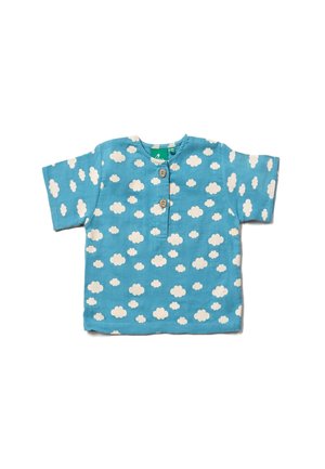 Light blue short-sleeve top featuring a cloud pattern in white, three wooden buttons at the neckline, and a round collar.