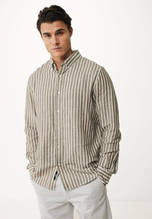 Camicia button-up a righe in khaki e bianco, con colletto, maniche lunghe e orlo dritto. Realizzata in un tessuto testurizzato.