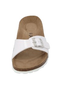 White slide sandal with a glossy strap featuring a silver buckle. Cushioned tan footbed with a textured surface and a white sole. Size 37.
