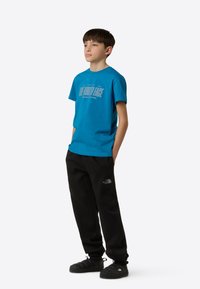 The North Face REFLECTIVE LOGO TEE - Potiskana majica - dusk blue