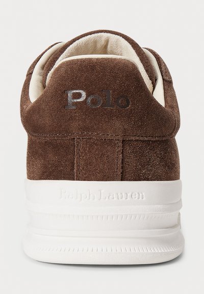Brown suede sneaker heel with white sole, "Polo" embroidered on upper, and "Ralph Lauren" embossed on midsole.