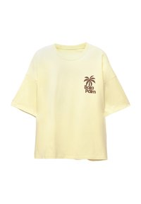 Keltainen puuvillapaita lyhyillä hihoilla, jossa on ruskea palmupuu -grafiikka ja "Baja Palm" -teksti vasemmassa rintakappaleessa.