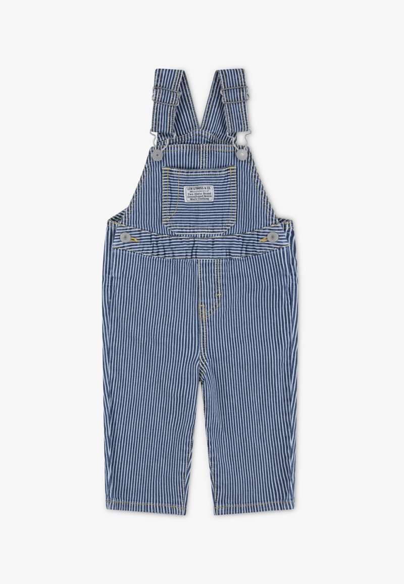 Gestreifte Denim-Latzhosen in Blau und Weiß mit verstellbaren Trägern, Fronttasche, silberner Hardware und gelben Nähten.