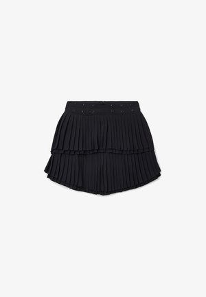 Black pleated skirt with two layers, featuring an elastic waistband and decorative grommets. Made from a smooth, lightweight fabric.