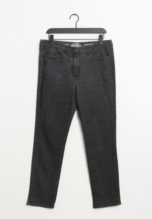 Jean en denim noir à coupe slim. Comprend cinq poches, des passants de ceinture et une fermeture à bouton. Texture lisse avec une légère décoloration.