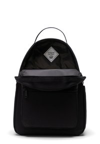 Black backpack with a rounded top, zipper closure, and a front pocket. Interior features a striped lining and a fabric tag with text.