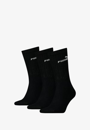 Schwarze Socken für die Crew, gerippte Textur, drei Paare, mit einem kleinen weißen Logo-Akzent im oberen Bereich. Weicher Stoff, Standardform.