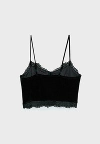 Sort bralette med justerbare stropper, lavet af velourmateriale. Har en blondekant i bunden og en glat, blød tekstur.