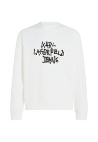 Bijela dukserica s dugim rukavima, koja sadrži crni izvezeni logo "KARL LAGERFELD JEANS" u stilu grafita na prsima.