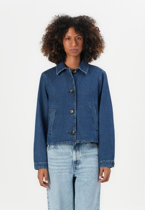 Dark blue denim jacket with a collar, five front buttons, two side pockets, and cropped design. Features a smooth texture and casual fit.